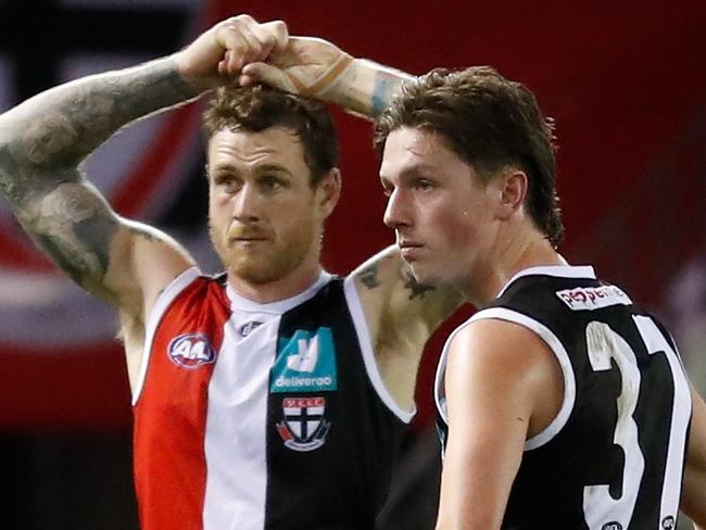 MELBOURNE, AUSTRALIA - JULY 17: Tim Membrey (left) and Leo Connolly of the Saints look dejected after a loss during the 2021 AFL Round 18 match between the St Kilda Saints and the Port Adelaide Power at Marvel Stadium on July 17, 2021 in Melbourne, Australia. (Photo by Michael Willson/AFL Photos via Getty Images)