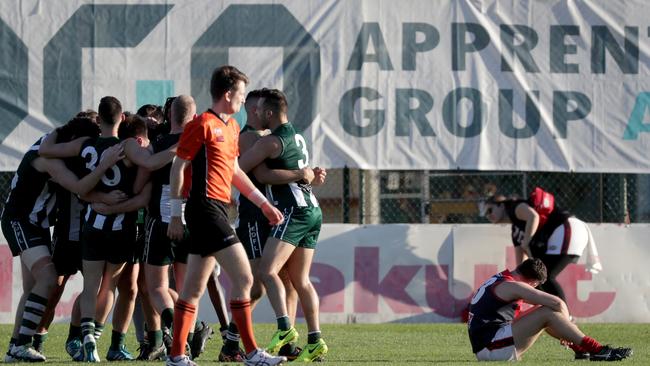 Airport West celebrates victory after an enthralling grand final. Picture: Mark Dadswell