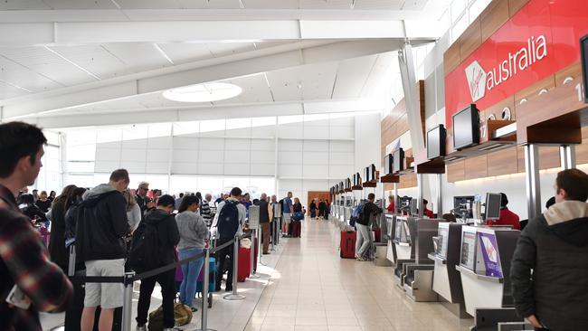 The line grows at Adelaide airport. Picture: AAP/Morgan Sette