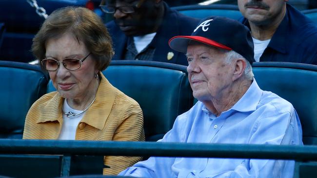 Former US president Jimmy Carter and his wife Rosalynn look on prior to the game between the Atlanta Braves and the Toronto Blue Jays at Turner Field in Atlanta, Georgia in 2015.