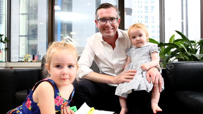 NSW Treasurer Dominic Perrottet, pictured with daughters Harriet, 3, and Beatrice, 1, says it has been a difficult year at work and home. Picture: Toby Zerna