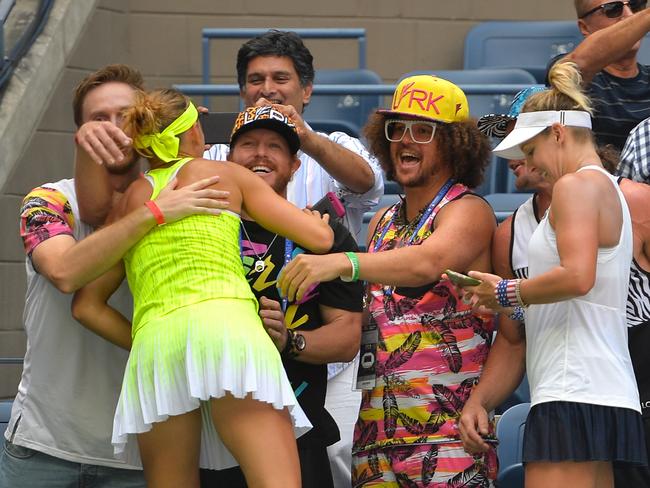Bethanie Mattek-Sands of the United States and Lucie Safarova of the Czech Republic celebrate with musician Redfoo after defeating Caroline Garcia and Kristina Mladenovic of France with a score of 2-6, 7-6, 6-4 in their Women’s Doubles Final Match on Day Fourteen of the 2016 US Open at the USTA Billie Jean King National Tennis Center on September 11, 2016. Picture: AFP
