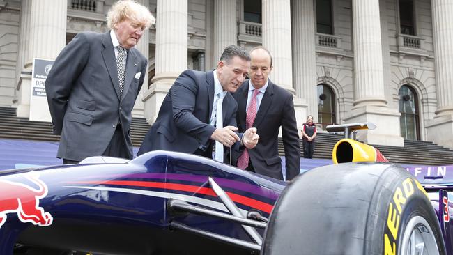 Ron Walker, left, with Tourism and Major Events Minister John Eren and AGPC CEO Andrew Westacott. Picture: David Caird.