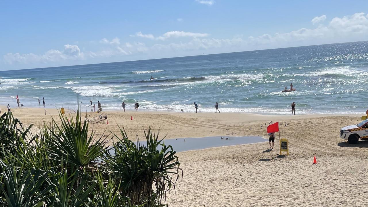 Lifesavers on jet skis kept a close eye on a bait ball that attracted about 35 sharks close to the shore at Coolum Beach. Picture: Letea Cavander