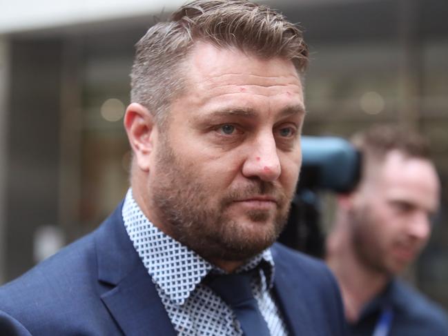 MELBOURNE, AUSTRALIA - NewsWire Photos, April 29, 2024. Hearing for former AFL star Sam Fisher over cross-border drug trafficking operation. Pictured leaving the County Court in Melbourne.  Picture: NCA NewsWire / David Crosling