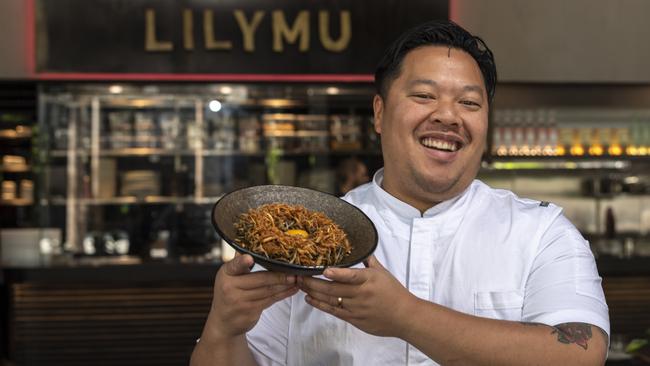 LilyMu executive chef Brendan Fong with the signature black garlic mie goreng. Picture: Monique Harmer