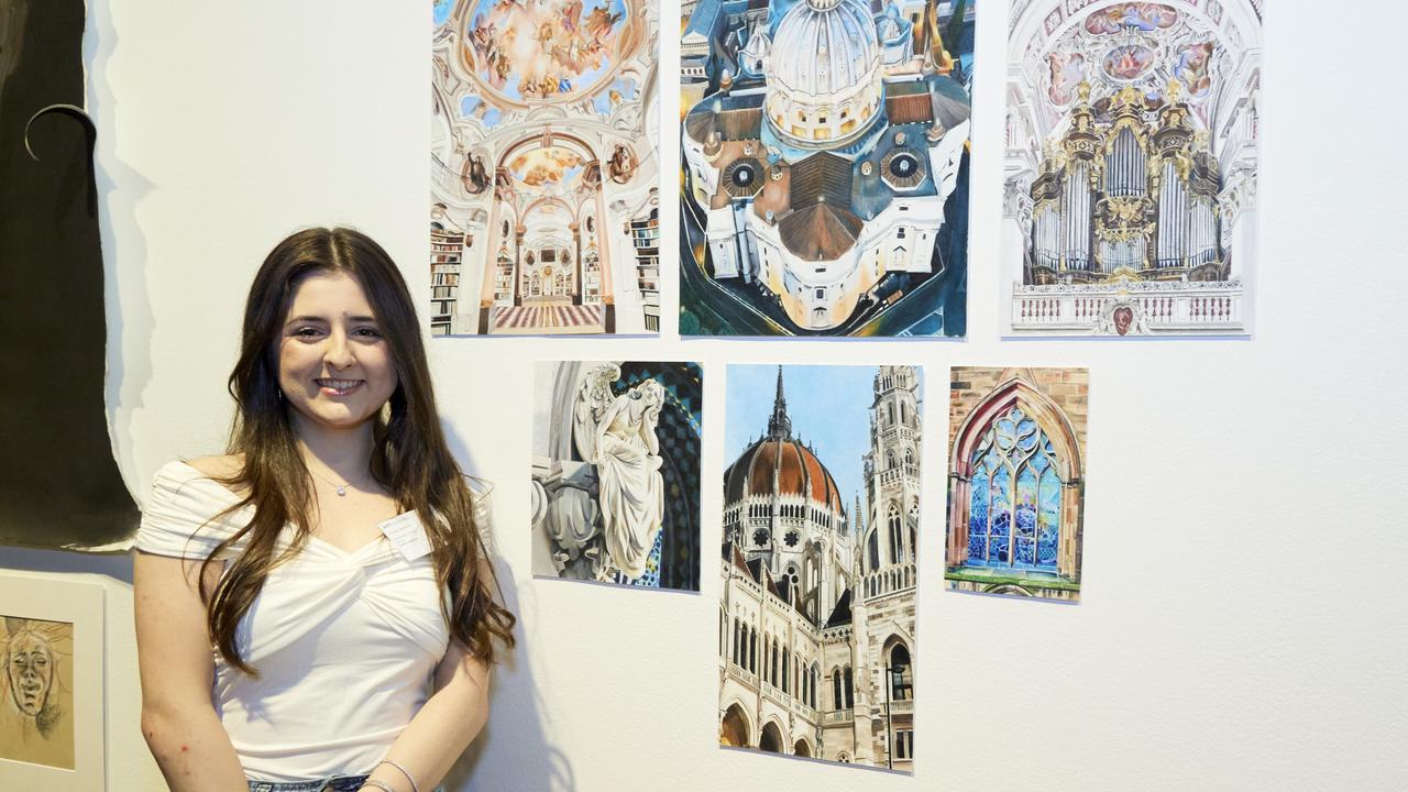 Alyssa Cavallaro, Aquinas Catholic College, with her work 'Menai Chiese e cattedrali'. Picture: Mim Stirling