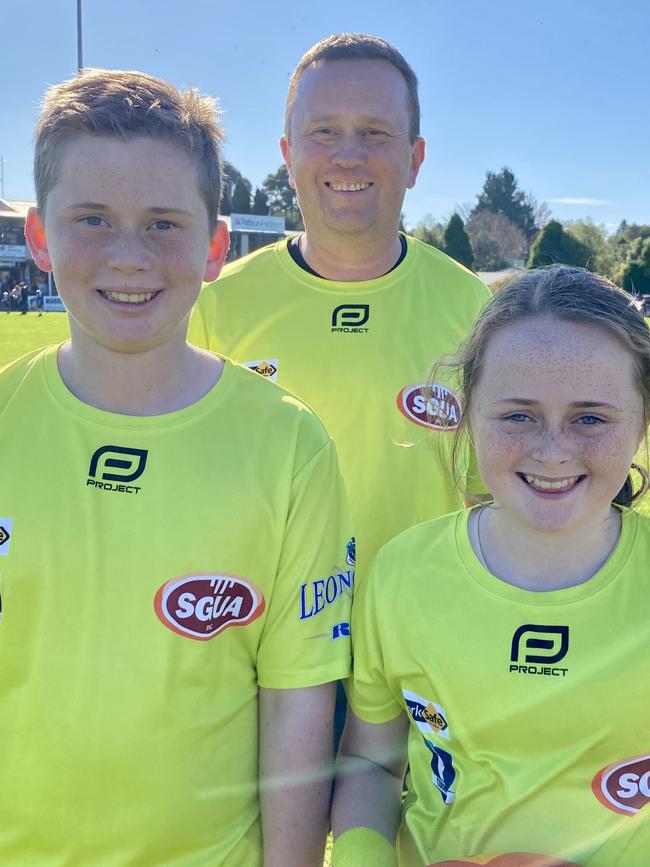 Supplied Editorial Paul Carter with his children Max and Lucy. They're part of the South Gippsland Umpires Association and are helping to buck the trend of falling participation rates. Photo: Supplied.