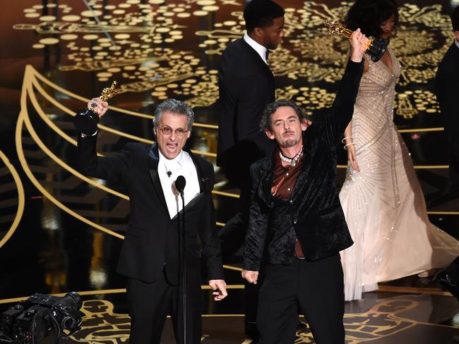 Mark A. Mangini and David White accept the Best Sound Editing award for Mad Max.