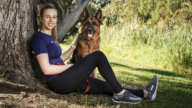 Alex Haydon with her dog Ace, is a finalist in this year’s School Sports Awards. Picture: AAP/Mike Burton