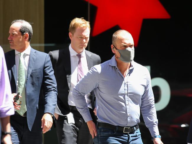 SYDNEY, AUSTRALIA - NewsWire Photos, NOVEMBER 16 2021:  Sydney siders are seen wearing suits as they walk down Pitt street at lunch time in the CBD, in Sydney. Picture: NCA Newswire / Gaye Gerard