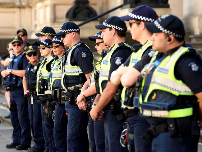 Extra police stand outside Parliament after the taxi protest tried to storm the building. Picture: Nicole Garmston