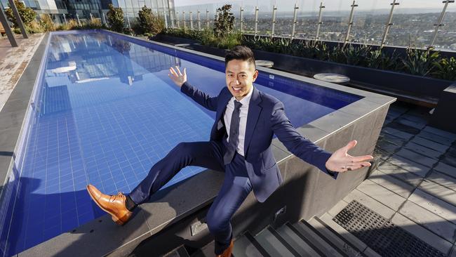 Calvin Chan, pictured poolside at The Chen in Box Hill, is one of the top real estate agents under 35 in Victoria. Picture: Alex Coppel