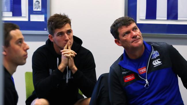 Small forwards work through the weekends game against Fremantle with assistant coach Leigh Tudor and Brent Harvey. Pic: Michael Klein