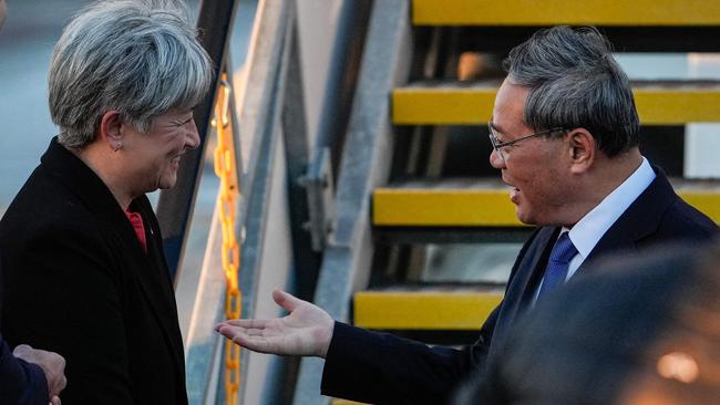 Foreign Minister Penny Wong welcomes China's Premier, Li Qiang, at Adelaide Airport. Picture: AFP