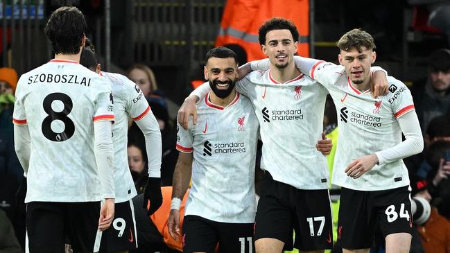 BOURNEMOUTH, ENGLAND - FEBRUARY 01: Mohamed Salah of Liverpool celebrates scoring his team's second goal with teammates Curtis Jones, Conor Bradley, Darwin Nunez and Dominik Szoboszlai during the Premier League match between AFC Bournemouth and Liverpool FC at Vitality Stadium on February 01, 2025 in Bournemouth, England. (Photo by Mike Hewitt/Getty Images)