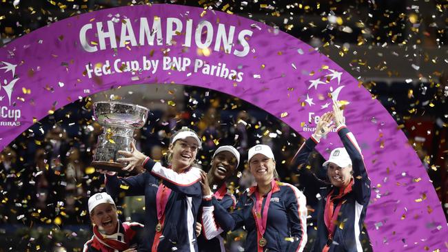 United States' celebrates during the awarding ceremony after winning the Fed Cup final.