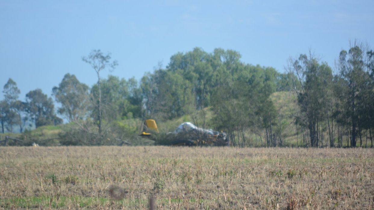 The fixed-wing aircraft crash landed into trees on a property after the plane failed to maintain altitude on a fertiliser run at Dalby about 5am Friday. Picture: Nicole McDougall