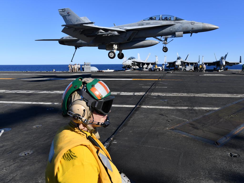 An F/A-18F Super Hornet is seen landing on the USS Ronald Reagan. Picture: AAP Image/Darren England