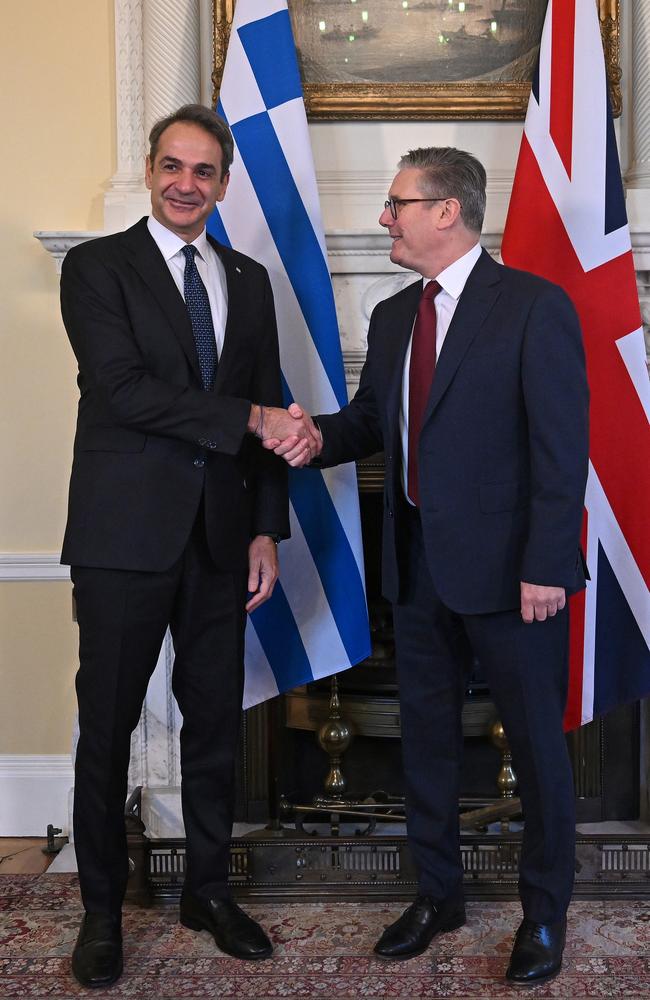 Greece's Prime Minister Kyriakos Mitsotakis shakes hands with Britain's Prime Minister Keir Starmer as they pose for a photograph ahead of their meeting inside of 10 Downing Street on December 3. Picture: Justin Tallis - WPA Pool/Getty Images