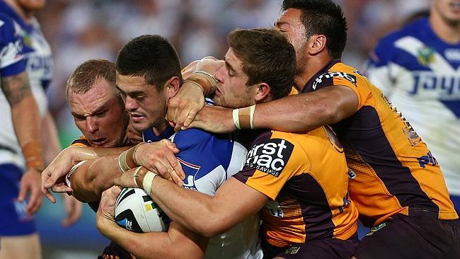 PACK mentality as the Broncos defence swarms on Bulldog Pat O'Hanlon in Round 1.