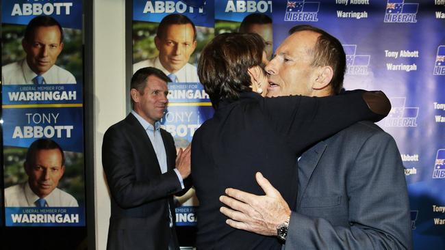 Tony Abbott is hugged by wife Margie. Picture: Braden Fastier