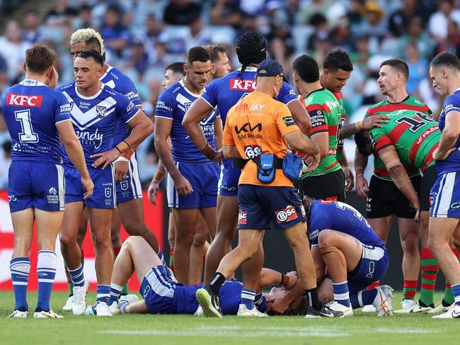 Jacob Preston of the Bulldogs receives medical attention. Picture: Cameron Spencer/Getty Images