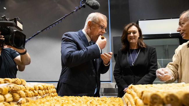 Mr Morrison visits a family owned Lebanese sweets business in the electorate of Parramatta on Thursday. Picture: Jason Edwards