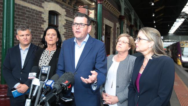 Premier Daniel Andrews, centre, at Geelong station today. Picture: Alison Wynd