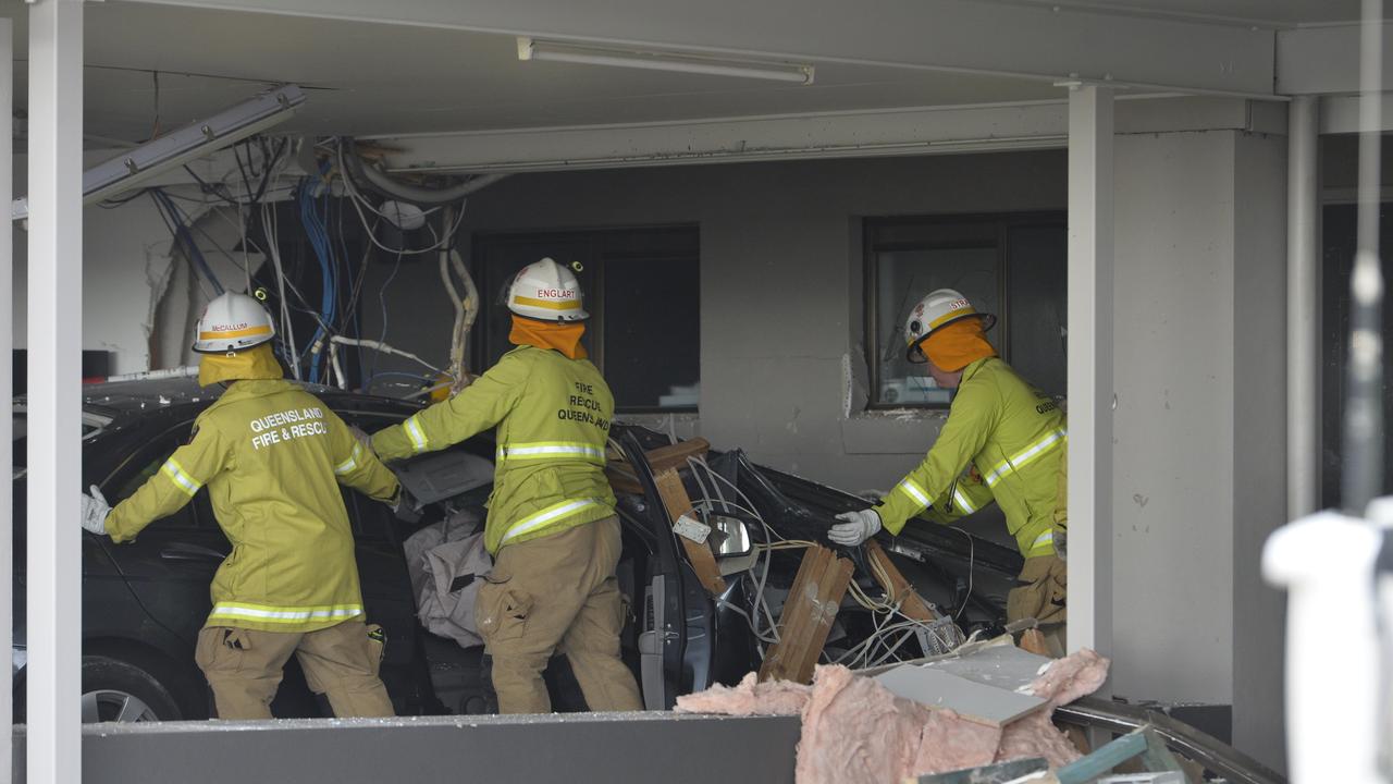 Emergency services at the Allan Cunningham Motel on Ruthven St where a car smashed into the building in Kearneys Spring, Thursday, October 11, 2018.