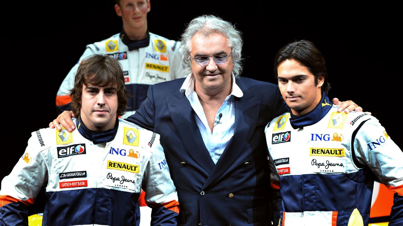 Fernando Alonso (l) and Nelson Piquet Jr (r) with team boss Flavio Briatore (c) ahead of the 2008 F1 season… a year that would end in dramatic controversy.
