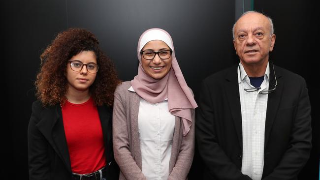 Saeed Maasarwe (right) and daughter Noor (left) at the launch of an award in honour of Aiia Maasarwe, awarded to Dr Khadra Salami (centre). Picture: David Crosling