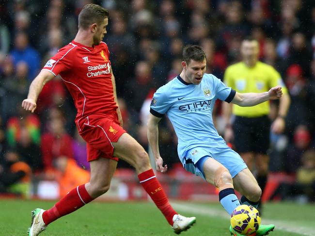 Jordan Henderson closes down Manchester City’s James Milner. Milner is now with Liverpool.