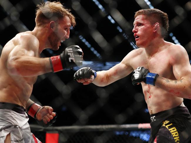 Mullarkey (right) before losing to Brad Riddel at UFC 243 at Marvel Stadium in Melbourne.