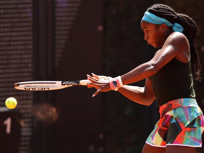 ROME, ITALY - MAY 12:  Cori Gauff of USA returns a forehand on day 5 of the the Internazionali BNL dÃ¢â¬â¢Italia match between Cori Coco Gauff of USA and Maria Sakkari of Greece at Foro Italico on May 12, 2021 in Rome, Italy. Sporting stadiums around Italy remain under strict restrictions due to the Coronavirus Pandemic as Government social distancing laws prohibit fans inside venues resulting in games being played behind closed doors. (Photo by Clive Brunskill/Getty Images)