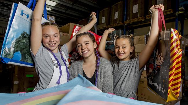 Tamikia Hine, 12, Bronte Quig, 10, and Jaz Fennell, 10, are hoping to buy some showbags next weekend. Picture: Jerad Williams