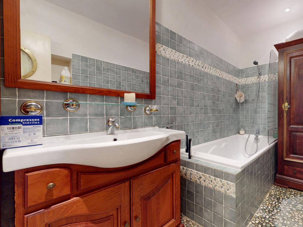 The home has an older-style bathroom.