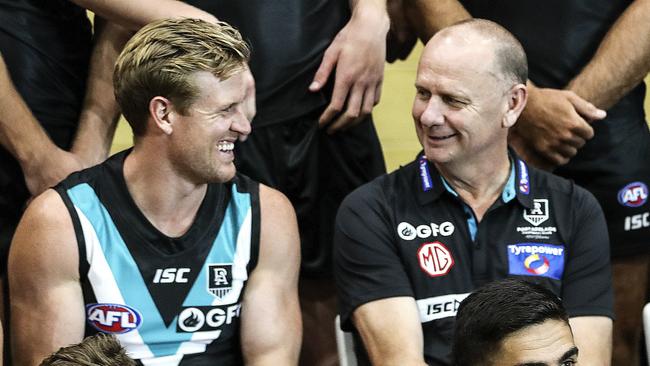 Ken Hinkley chats with Tom Jonas on Port Adelaide’s team photo day. Picture: Sarah Reed.