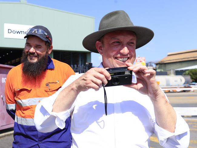 Premier Steven Miles visits the Downer in Maryborough on the election trail and takes a photo of the media on his old film camera for some fun. Pics Adam Head