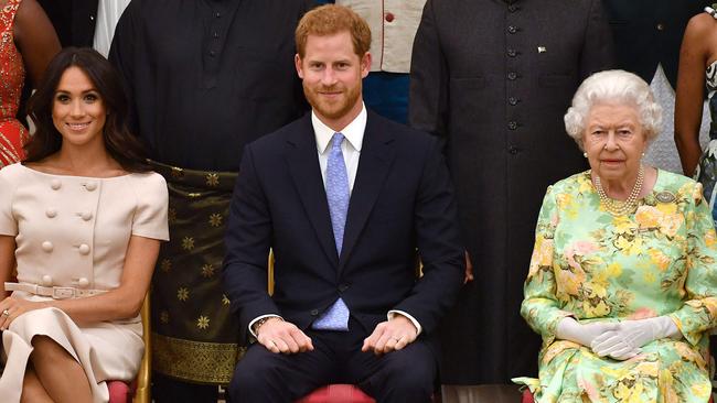 The Duke and Duchess of Sussex join the Queen in 2018. Picture: John Stillwell / POOL / AFP