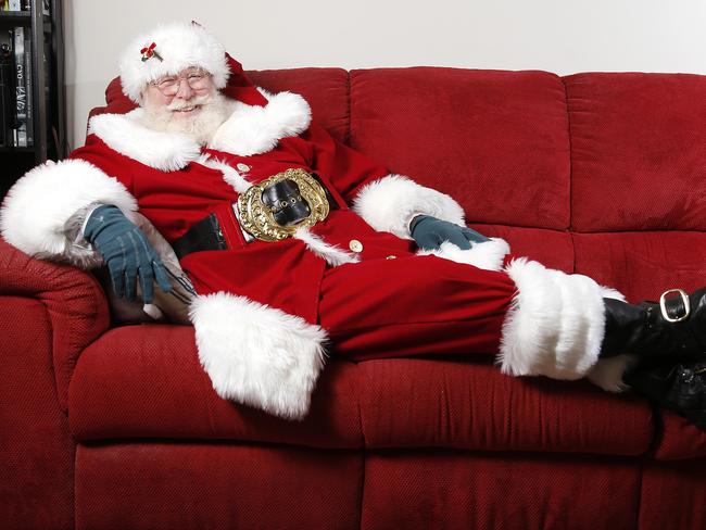 Santa Glenn has a rest before the Christmas spirit really ramps up. Picture: Josh Woning/AAP