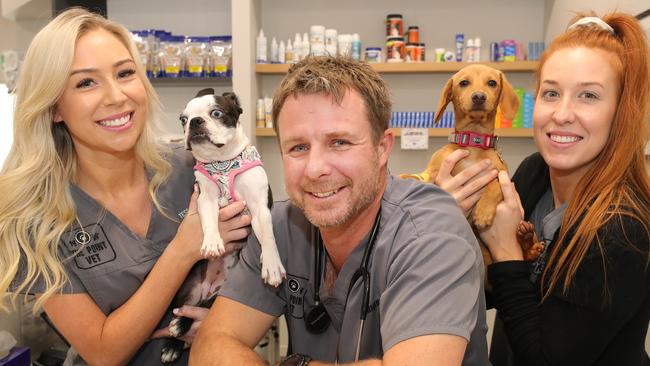 Owner and head vet Dr John Rigley, with Boston terrier Daphne and Dachshund Stanley, and Vet Nurses Tess Nolan (left) and Summah Woods (right). Picture Glenn Hampson