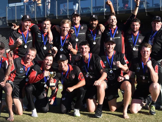 South Caulfield players show off the premiership cup. Picture: Ron Weil