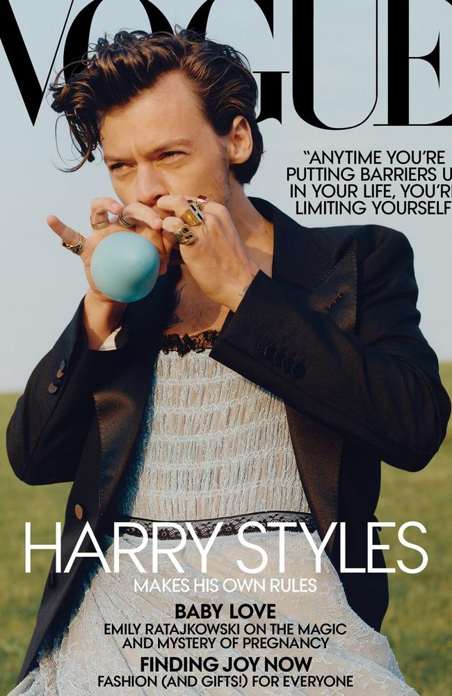 Harry styles wears a dress on the December 2020 cover of Vogue Magazine. Photographer: Tyler Mitchell