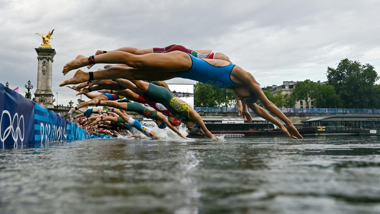 No thanks: athletes braved the possible risk of contamination in the Seine to compete during the women's individual triathlon on July 31, but organisers are now facing questions about the water testing. Picture: Martin Bureau/Pool/Getty Images