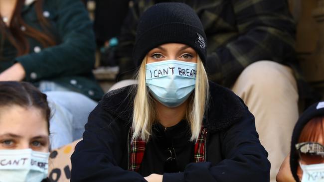 One of the protesters had “I can’t breathe” written on her face mask. Picture: Matrix