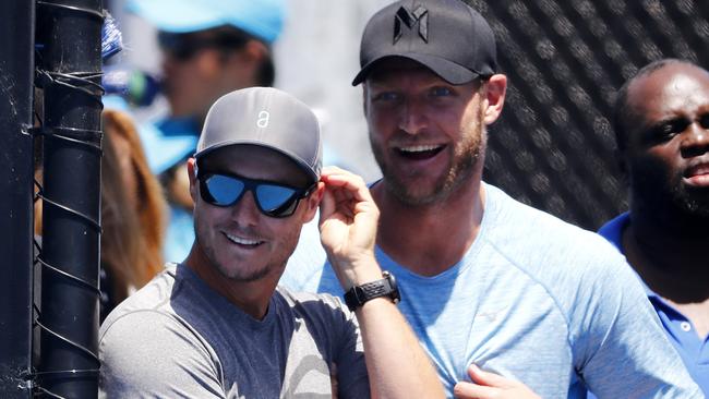 Sam Groth and Lleyton Hewitt keep a close eye on the Australian Open playoffs.