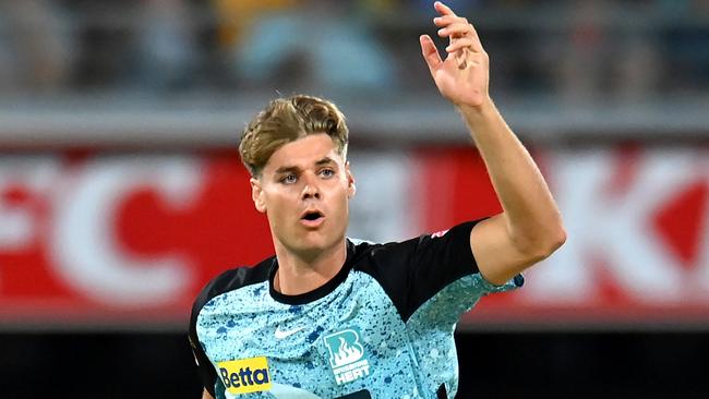 BRISBANE, AUSTRALIA - DECEMBER 07: Spencer Johnson of the Heat reacts during the BBL match between Brisbane Heat and Melbourne Stars at The Gabba, on December 07, 2023, in Brisbane, Australia. (Photo by Albert Perez/Getty Images)