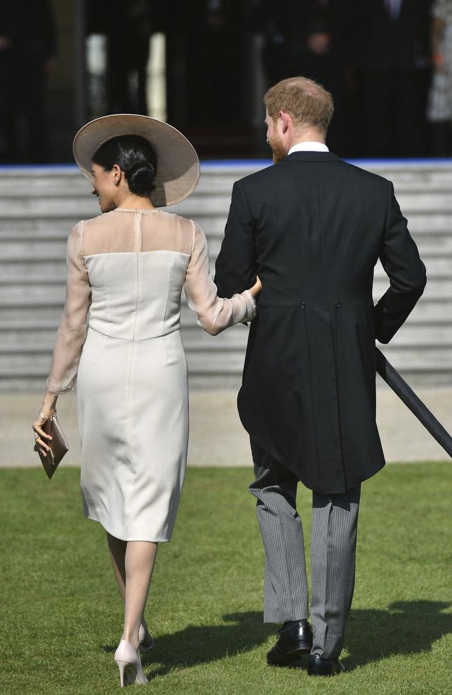 Harry and Meghan at their first event as a married couple. Picture: Dominic Lipinski via AP