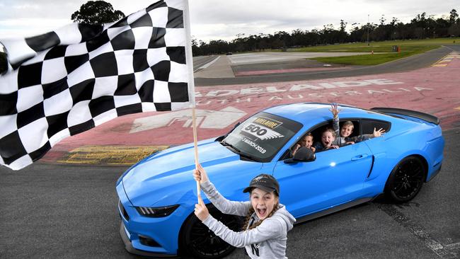 The 2019 Adelaide 500 will be the first event that will feature Mustangs as the Ford entries. Pictured are Mustang fanatics Alexis, 11, Thomas, 10, Paige, 8, and James, 8, in a 2017 Ford Mustang GT owned by Kristian Oliver. Picture: Tricia Watkinson